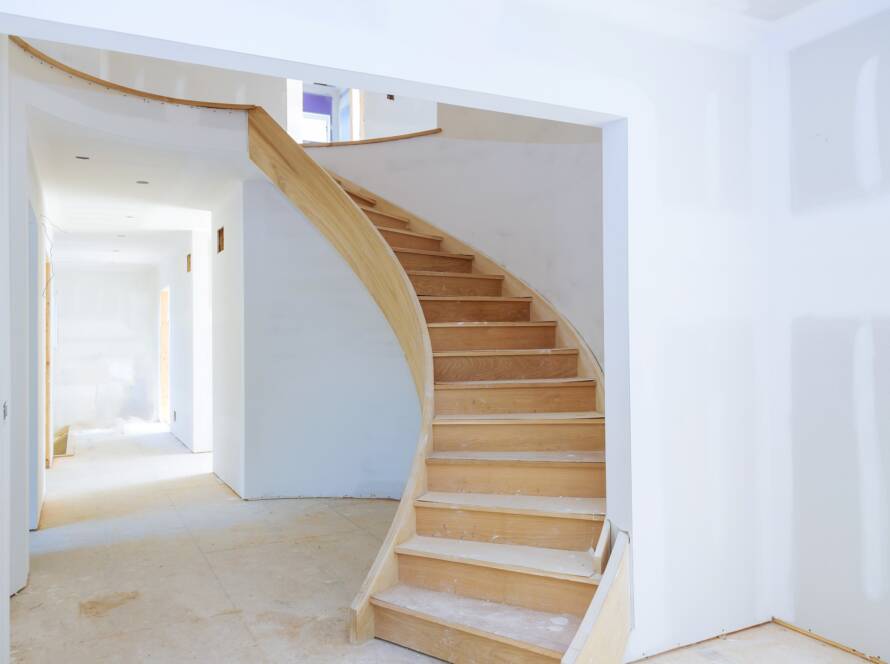 Walls of unfinished renovated living room of inside house under construction